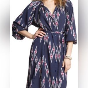 Tucker 3/4 sleeve dress with belt.